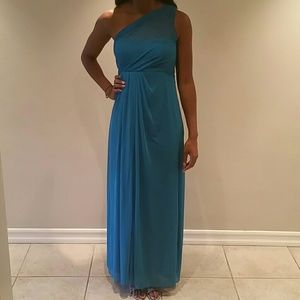 Davids Bridal turquoise evening gown.